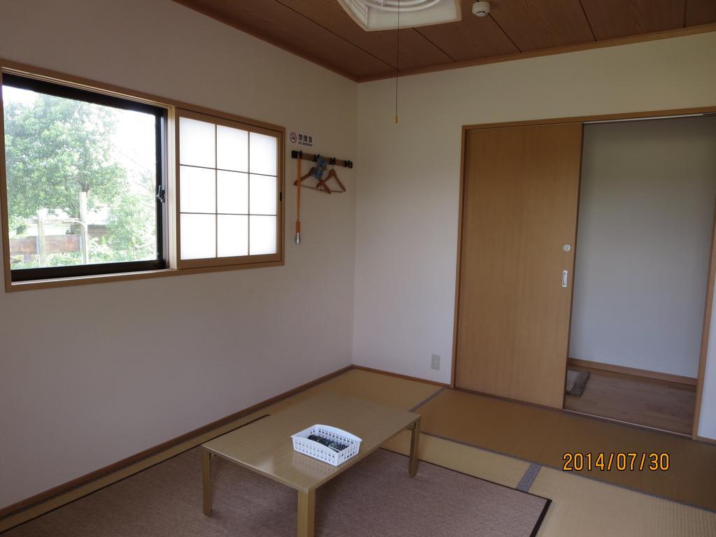 Guesthouse Suzukaze Shibushi Rum bild